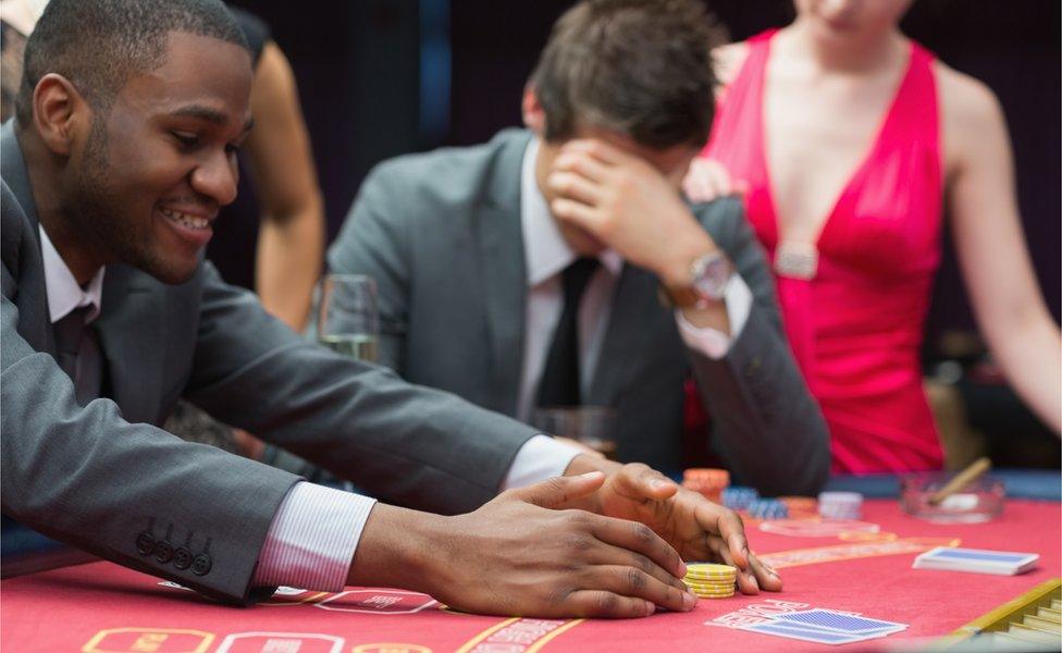 Man winning at poker