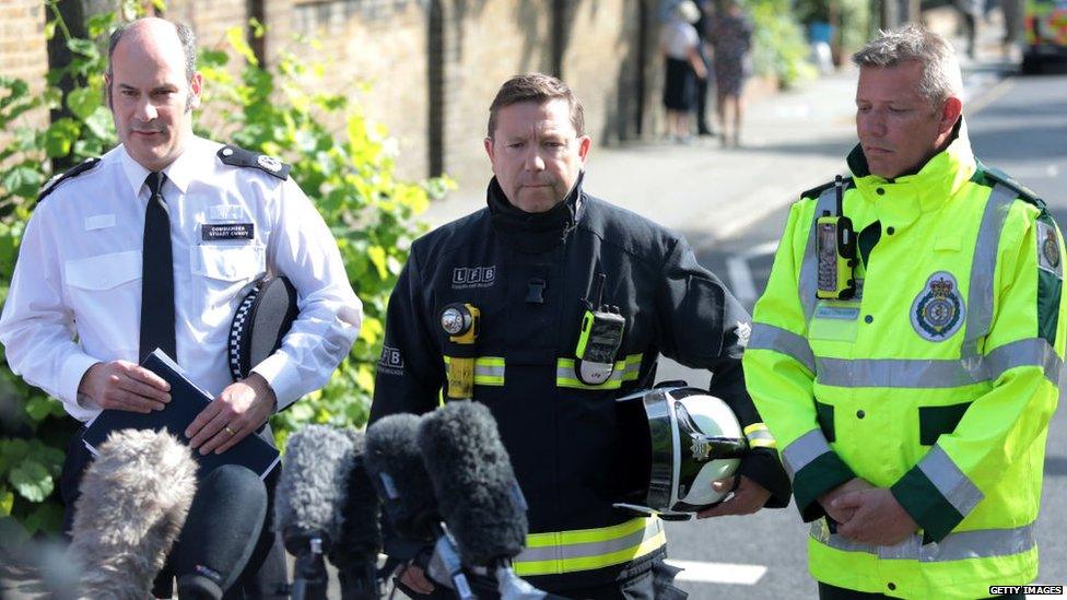 Commander Stuart Cundy of the Met Police, Steve Apter of London Fire Brigade and Paul Woodrow from the london ambulance service hold a press conference