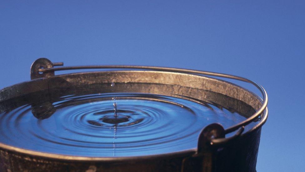 Water dripping into a bucket