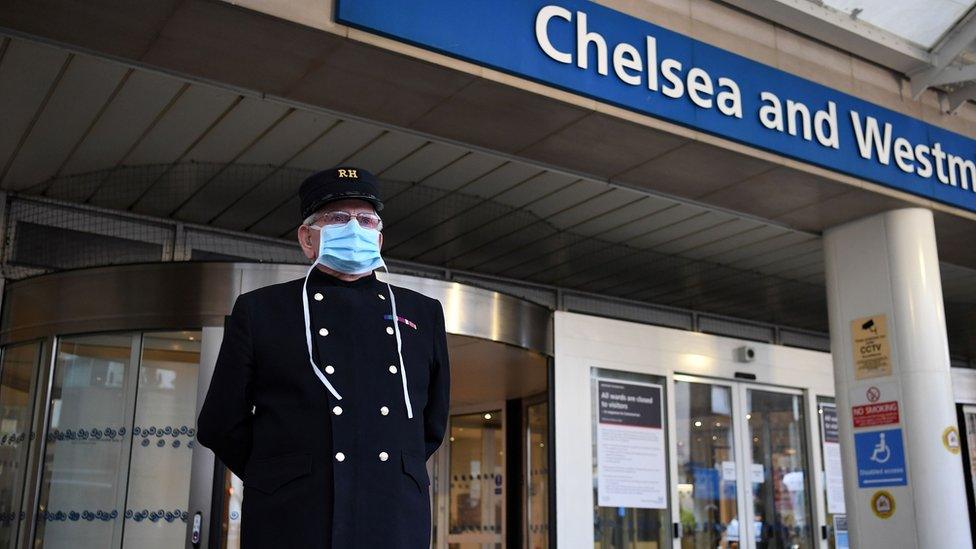 A veteran wearing a Royal Hospital Chelsea hat, and in PPE (personal protective equipment) of a face mask, as a precautionary measure against COVID-19, pauses for a minute"s silence to honour UK key workers, including Britain"s NHS (National Health Service) staff, health and social care workers, who have died during the coronavirus outbreak outside the Chelsea and Westminster Hospital in London