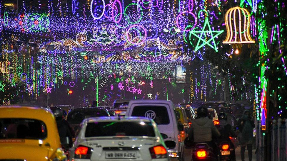 A street is Kolkata is seen decorated with Christmas lights ahead of Celebration of Christmas in Kolkata , India , on 21 December 2021 . (Photo by Debarchan Chatterjee/NurPhoto via Getty Images)