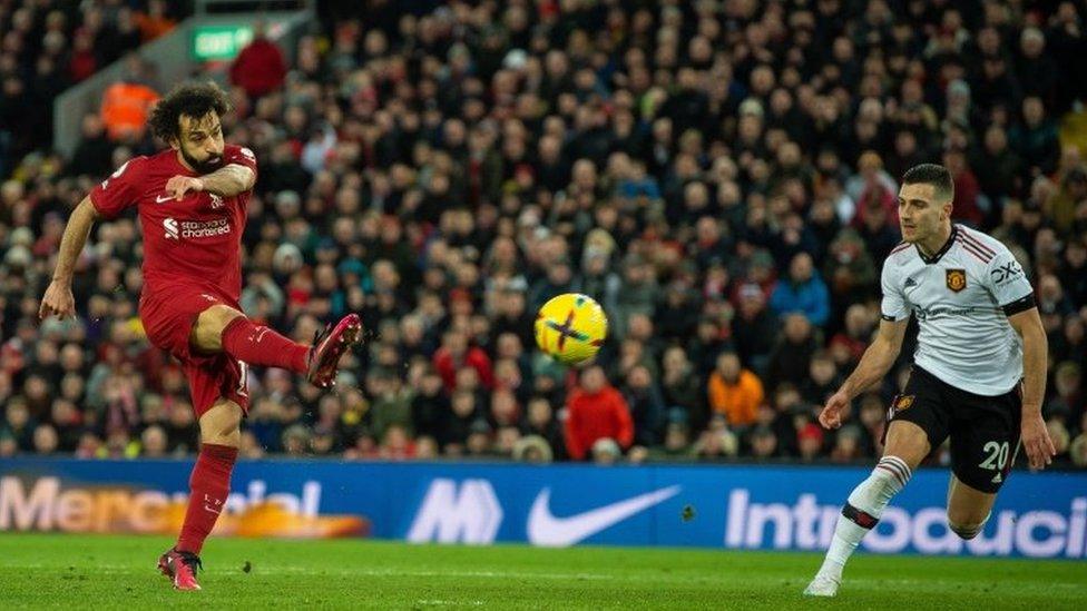 Mo Salah scoring a goal against Manchester United