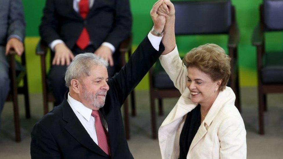 Brazil's President Dilma Rousseff (right) greets former president Luiz Inacio Lula da Silva during the appointment of Lula da Silva as chief of staff, at Planalto palace in Brasilia, Brazil, March 17, 2016.