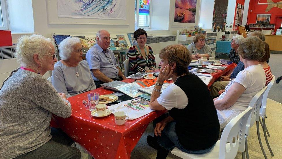 Residents attend a bibliotherapy session