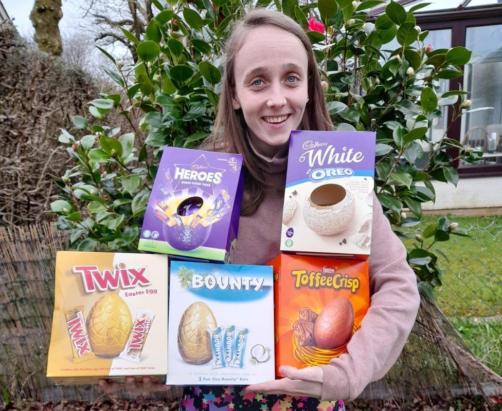 Zoe Richards holding five Easter eggs