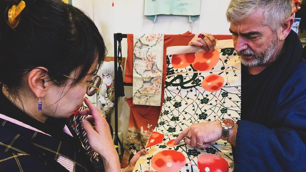 Phillip and Yumiko looking at Kimono fabric