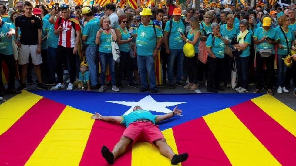 Catalans turn out on the streets of Barcelona in support of independence on their national day, known as the Diada