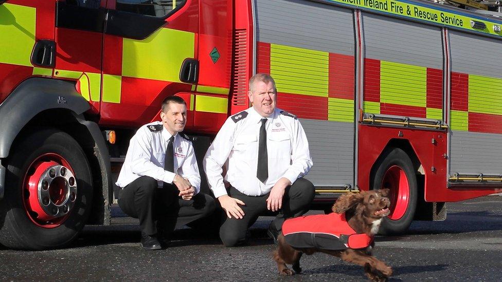 Reggie with firefighters