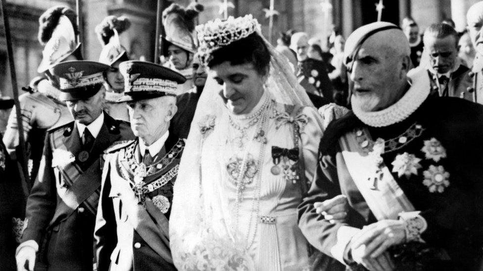 Queen Elena of Italy (second right) and King Victor Emmanuel III (second left) leave Vatican city after an official visit to Pope Pie XII on December 26, 1939