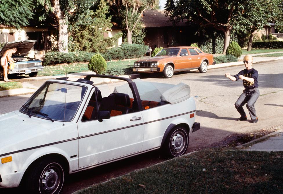 David Bowie clowning around outside Earl Slick's house in Los Angeles.