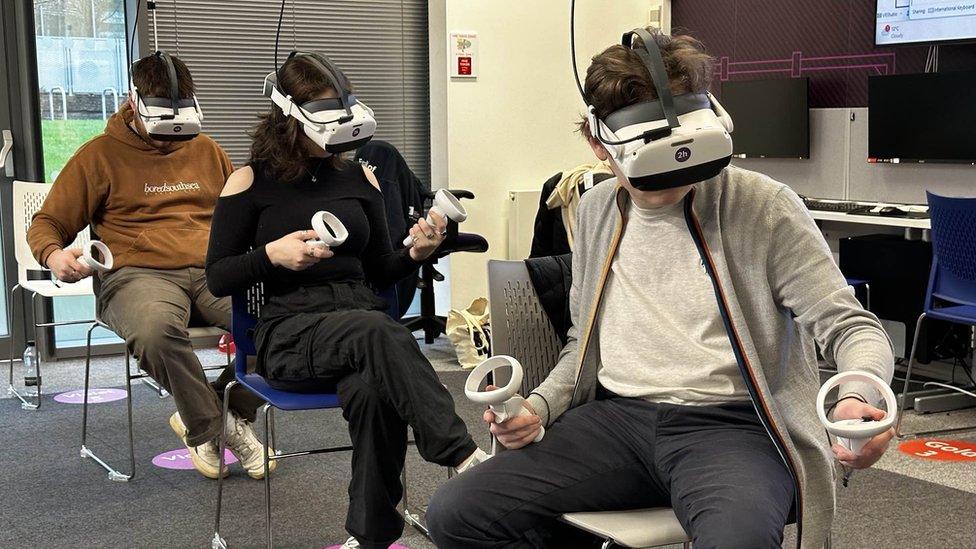 Students using VR headsets