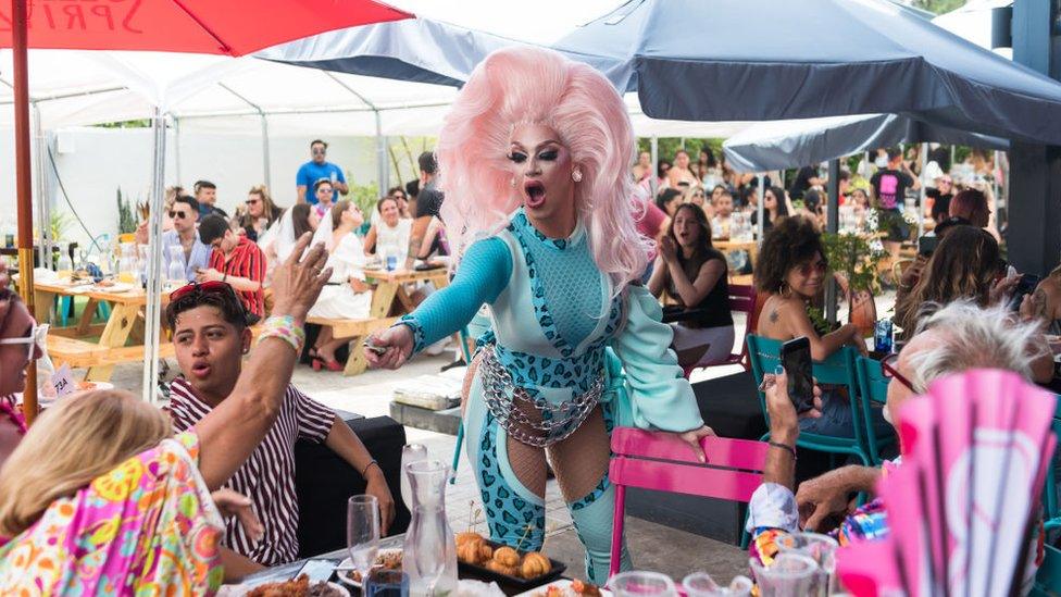 A drag performer performs at a Florida restaurant