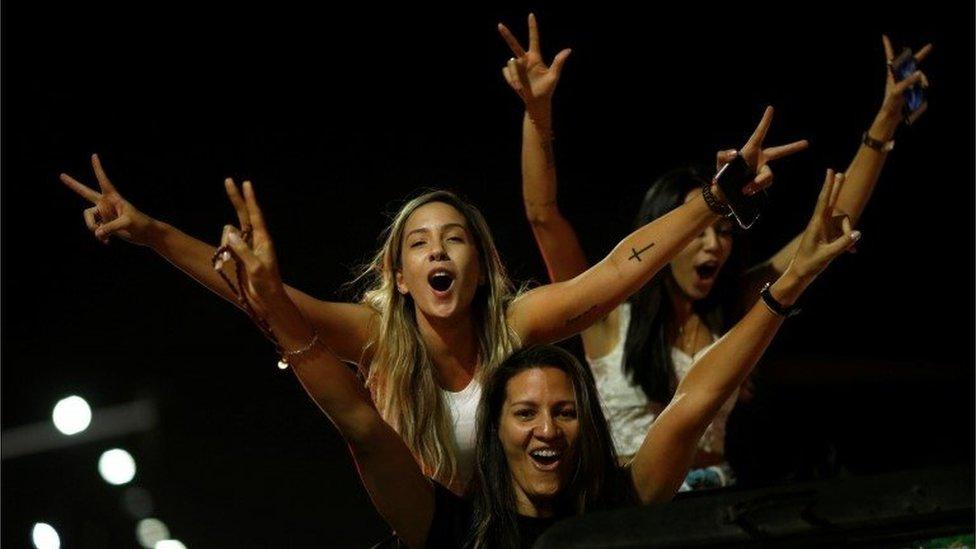 Supporters of Jair Bolsonaro cheer after he was elected president of Brazil