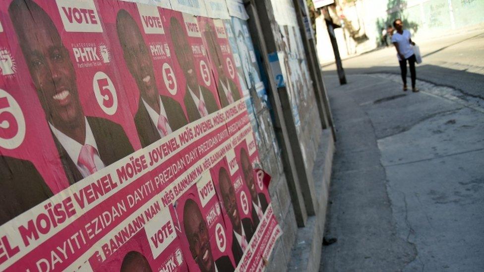 Election posters of pro-government candidate Jovenel Moise, 22 Dec 2015