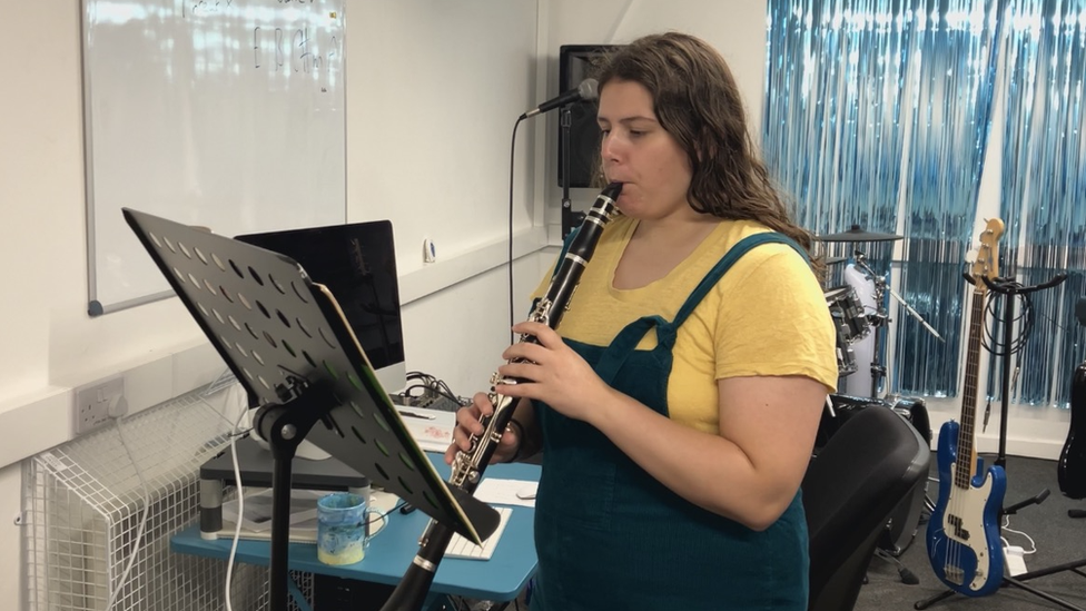 Bethan Batiste playing a clarinet