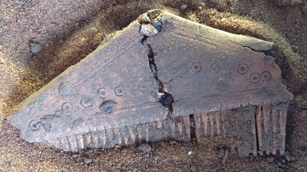 Comb in sand