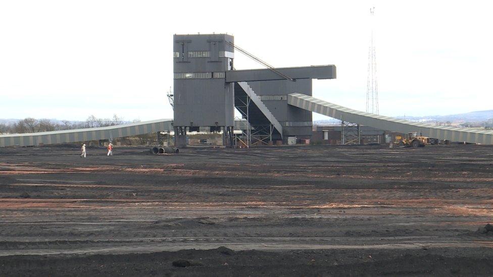 Piles of coal outside the power plant