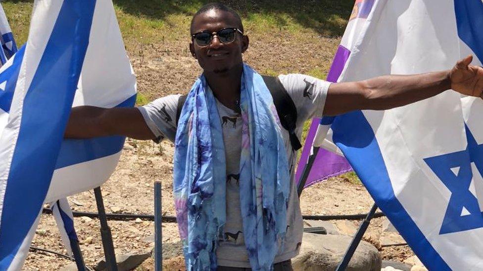 Eissa Muhamad with Israeli flag