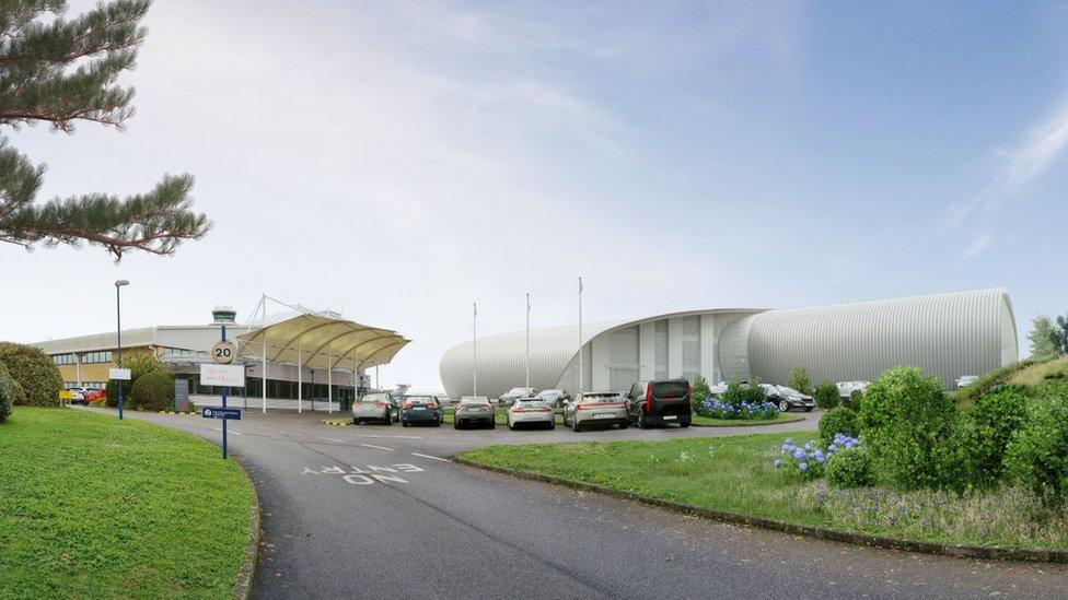 View from within airport boundary looking North across Gama Aviation car park to new facility