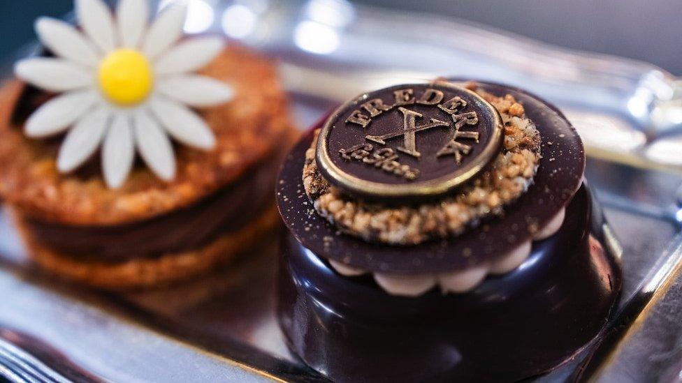 The Margrethe cake (L) and Frederik X cake in the shop window of Conditori La Glace, thought to be Denmark's oldest patisserie