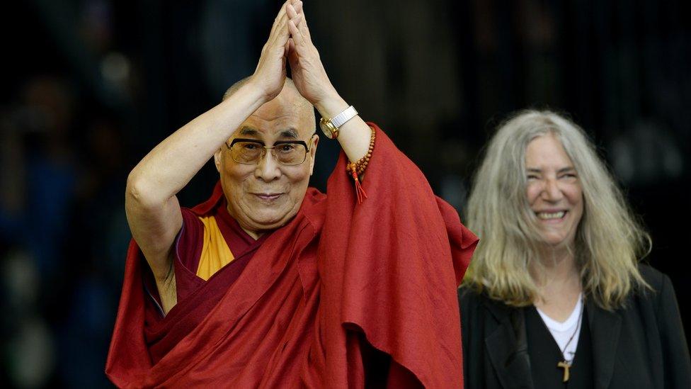 Dalai Lama and Patti Smith on stage at Glastonbury