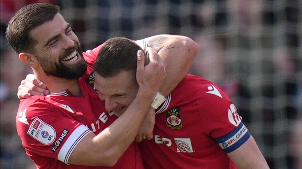 Wrexham's Elliot Lee and Paul Mullin celebrate