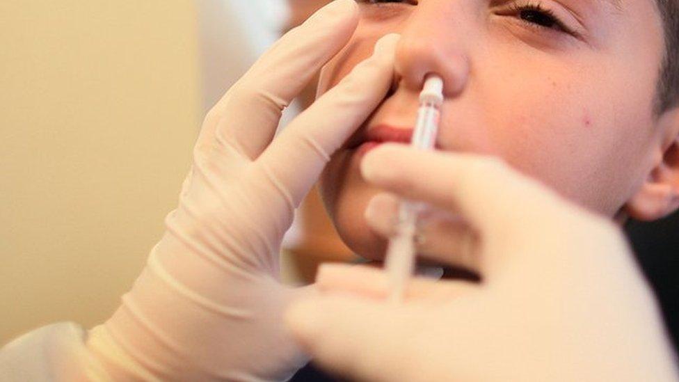 A child having the flu vaccine