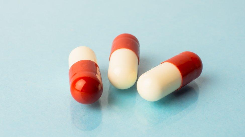 Red and white pills