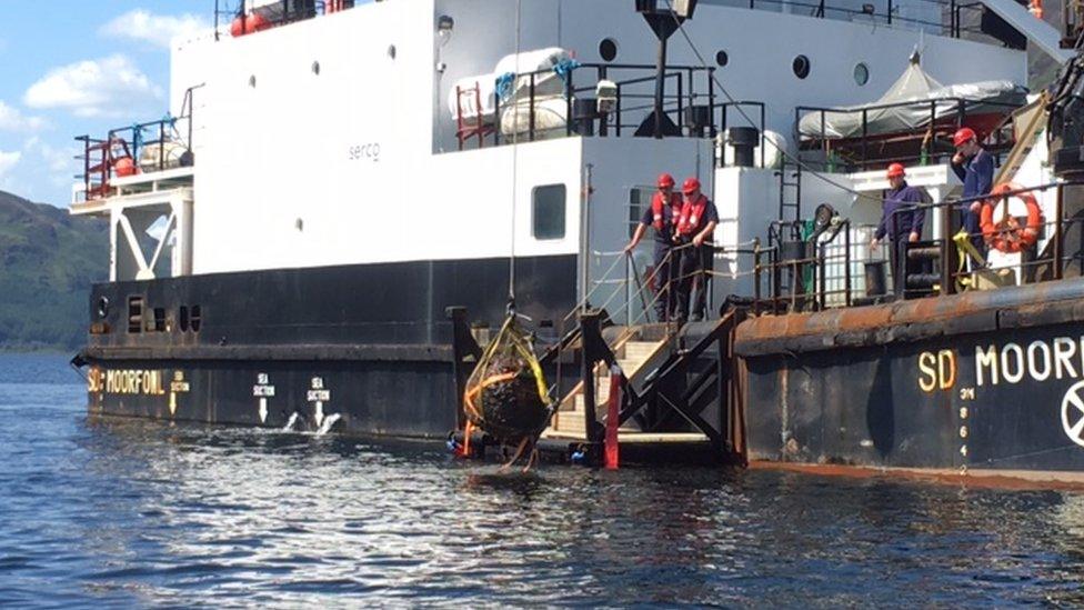 One of the bombs is lifted from the loch