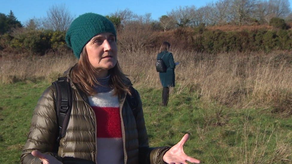 Claire Calverley standing in a field