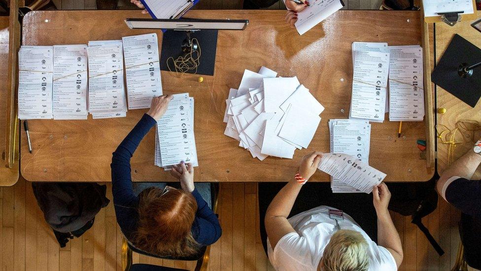 Ballots are tallied in Belfast City Hall as counting begins in the Northern Ireland council elections.