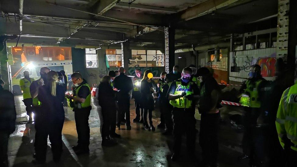 West Midlands Police officers at warehouse