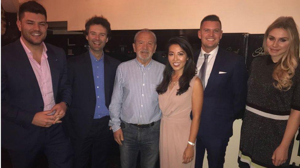 Photo of Lord Sugar in a restaurant in Chigwell, Essex with previous Apprentice show winners Mark Wright, Tom Pellereau, Susan Ma, Ricky Martin and Alana