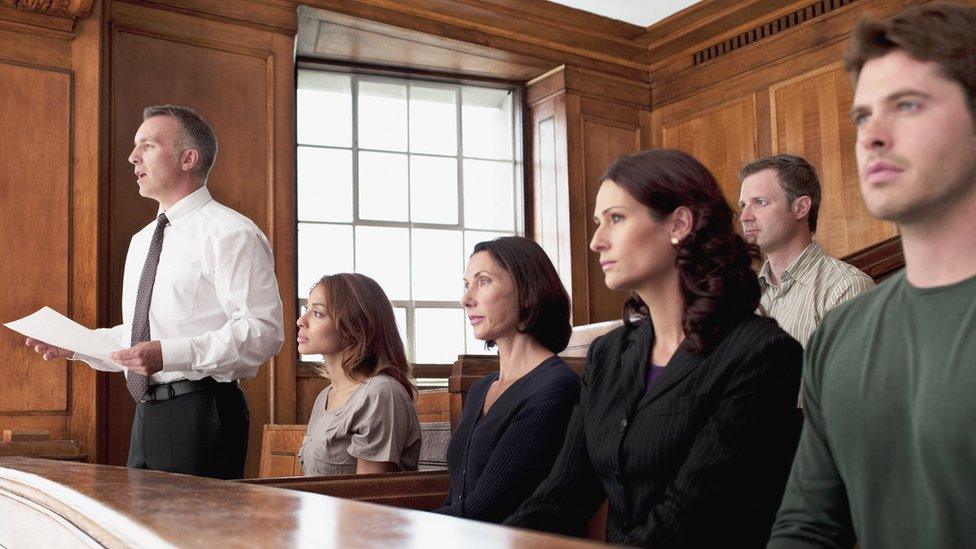 Jury sitting in courtroom