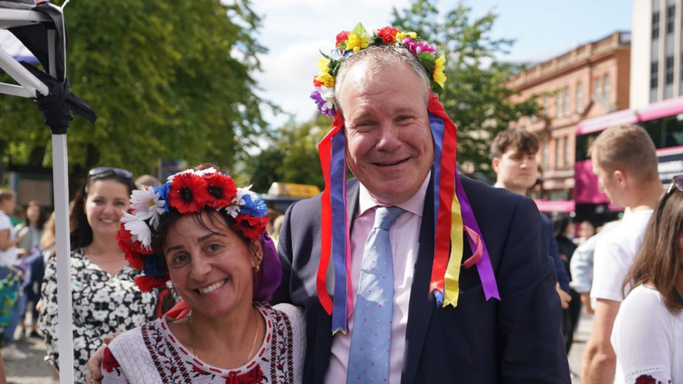 Minister of State for Northern Ireland Conor Burns (right) met Marina Furey, who is originally from Ukraine, when he attended the event