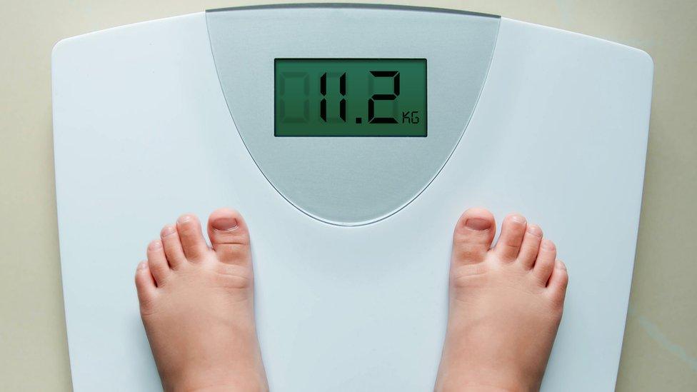 child on scales