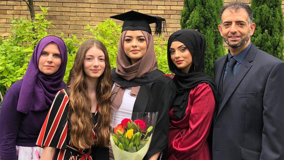 Amani, with her mother. Yasmin and sisters Meah, Ruqayyah and father Khuram on her graduation day