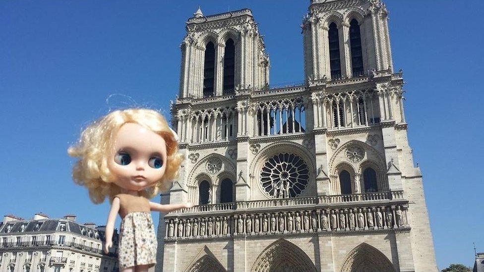 Blythe doll in front of Notre Dame