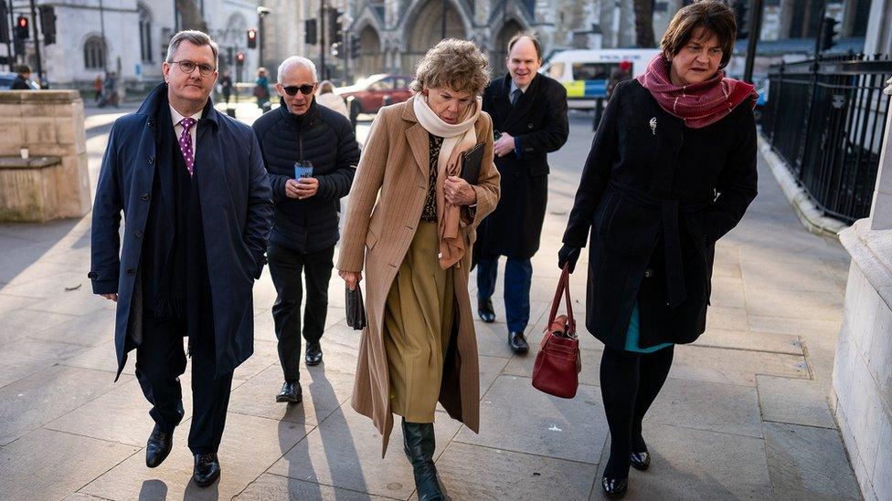 DUP leader Sir Jeffrey Donaldson, Baroness Kate Hoey, and former first minister Dame Arlene Foster outside the UK Supreme Court in London in February