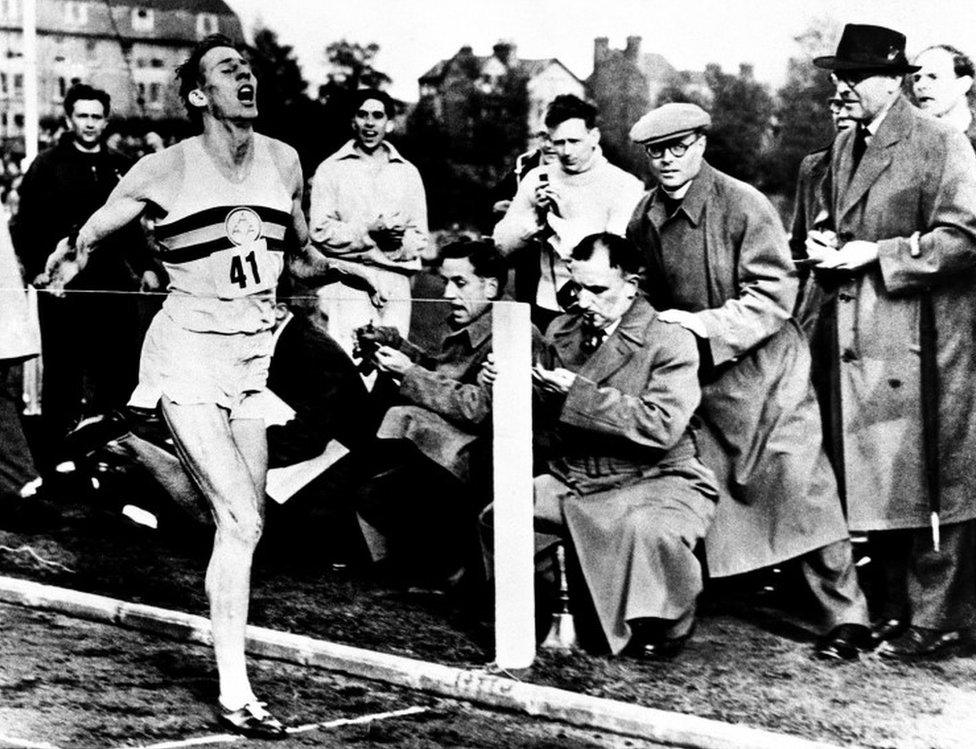 Roger Bannister finishing the race during an athletics meeting at Oxford where he ran the world's first four-minute mile