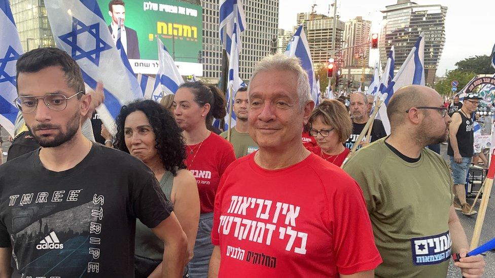 Professor Chen Hoffmann (C) at a protest against the Israeli government's judicial overhaul