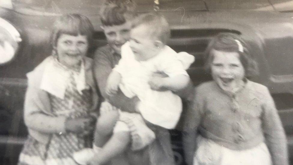 A family photo of Jane, Mary, Nygaire and Howard Bevan