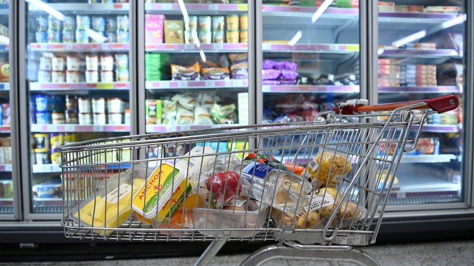 Shopping trolly holding items in a supermarket