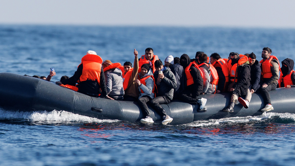 People crossing the English Channel on a small boat on 6 March