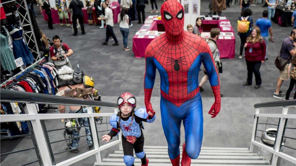 Father and daughter dressed up as Spiderman