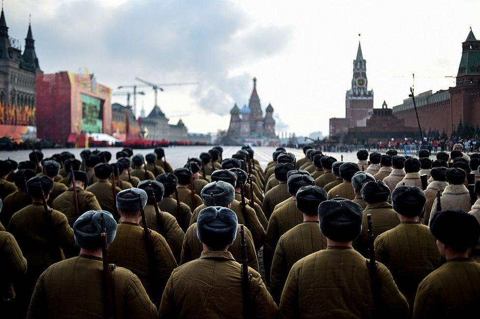 Russian soldiers wearing WWII uniforms parade in Moscow's Red Square in 2015