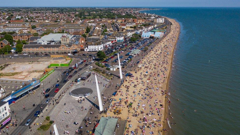 Sunbathers on a beach in Southend-on-Sea