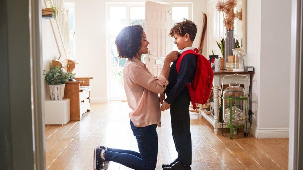 Child getting ready for school