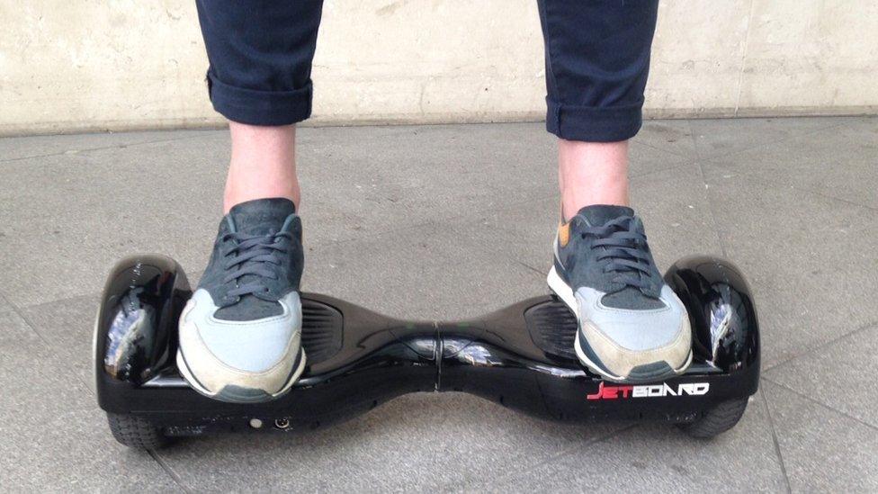 Feet on hoverboard