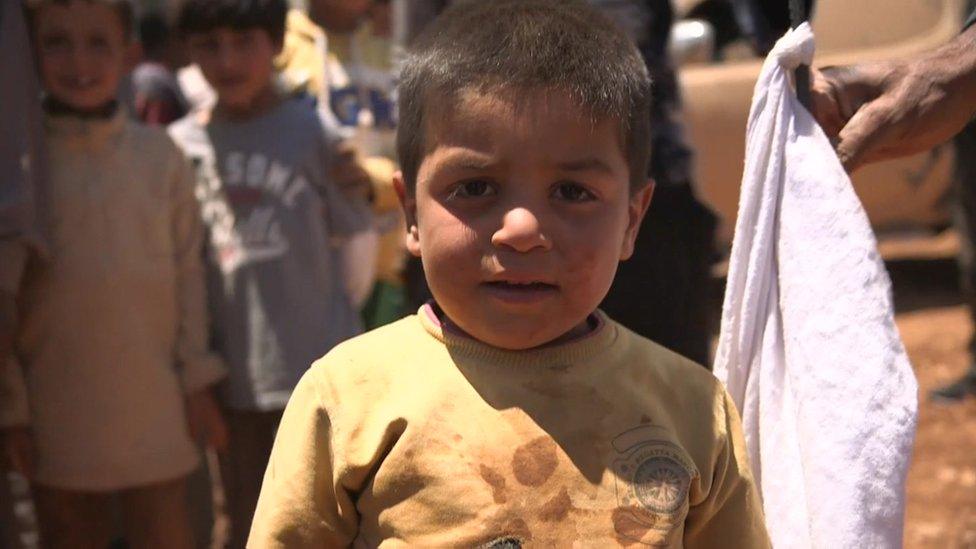 Civilians displaced by the fighting on outskirts of Manbij